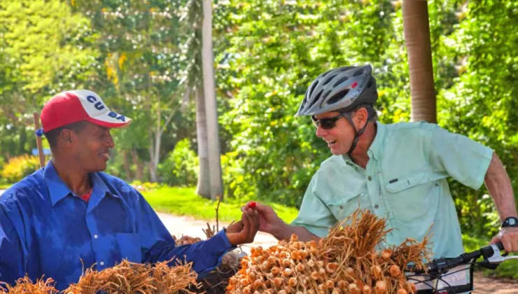 Tom Hale, Backroads Founder, meeting a Cuban Local