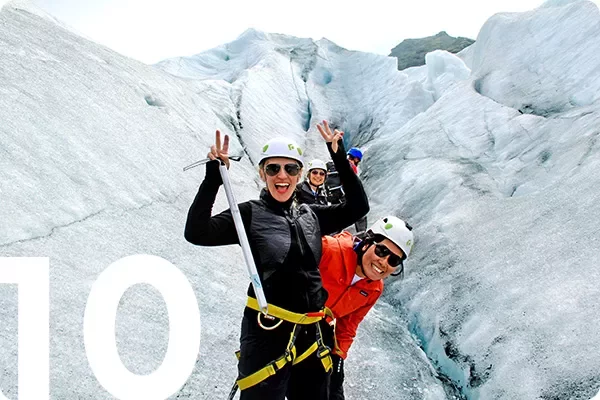 text:10; image: group of people ice climbing