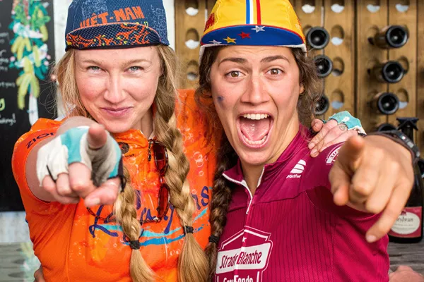 Two excited Backroads leaders pointing at the camera