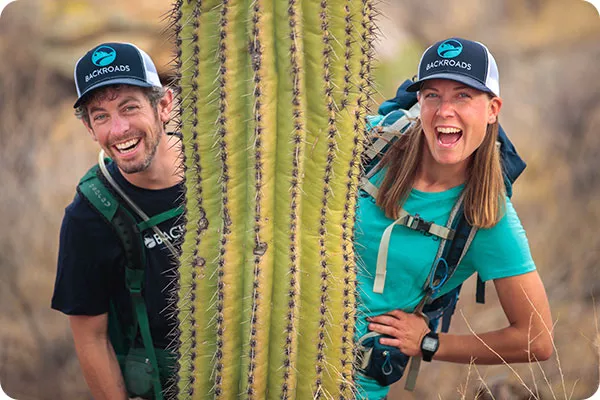 Backroads leaders posing with a cactus