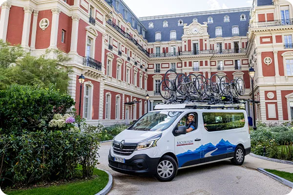 Backroads van parked in front of a hotel