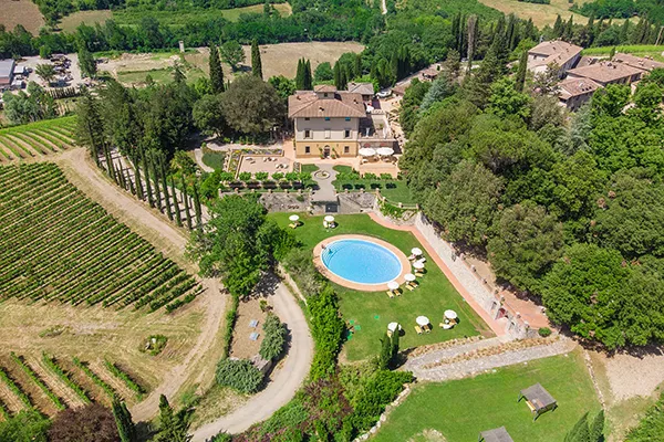 Aerial view of hotel with round swimming pool