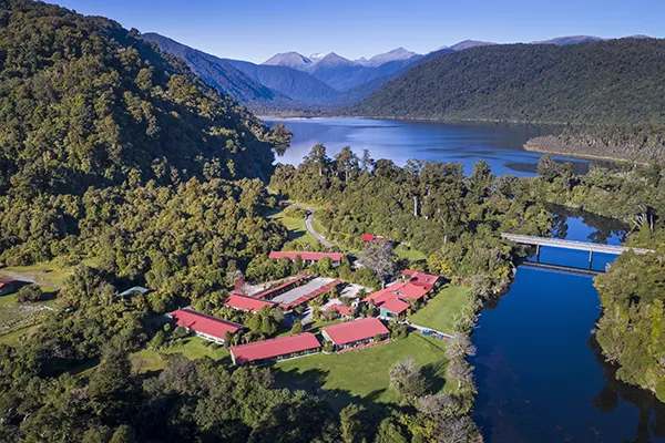 aerial view of hotel next to water