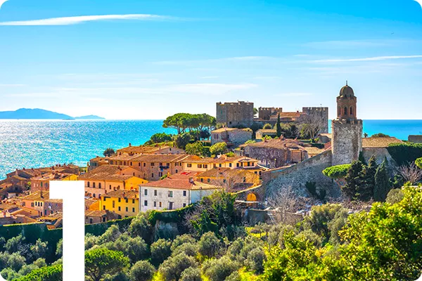 text:1; image: seaside town next to clear blue water