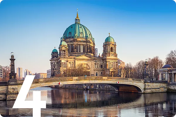 text:4; image: Capital Building in Berlin surrounded by river
