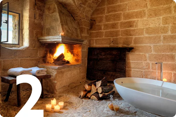 tetx:2; image: A fireplace and bathtub in a brick room