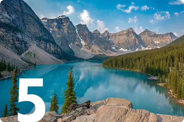 text:5; image: Blue lagoon surrounded by mountains