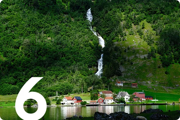 text:6; image: a waterfall running down a green mountain 