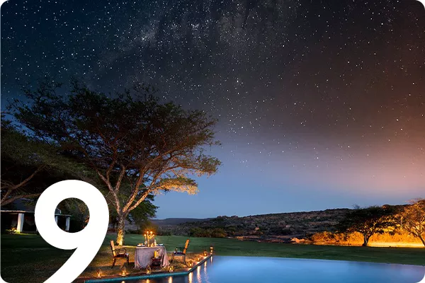 text:9; image: candlelit dinner by the lake under night sky