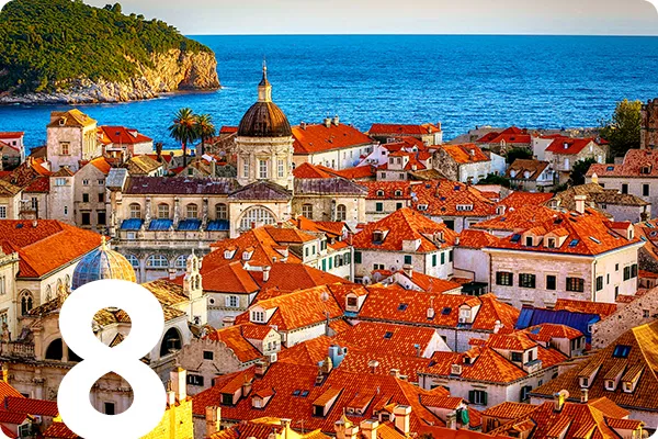 A seaside village of red roofed houses