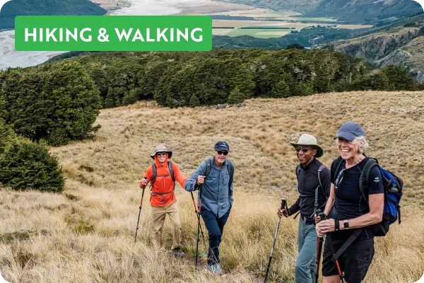 Hikers walking through fields