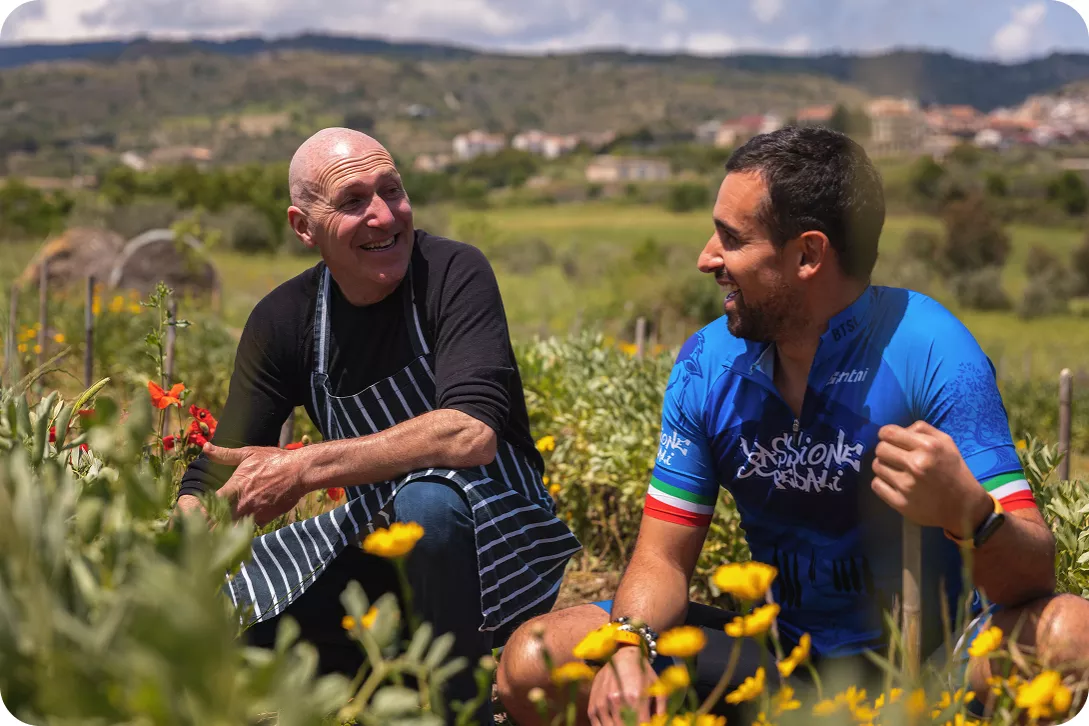 Backroads leader learning from a local guide in the field