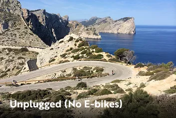 Cyclists on a winding mountain road