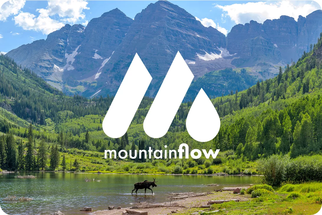 MountainFlow logo with large mountains in the background
