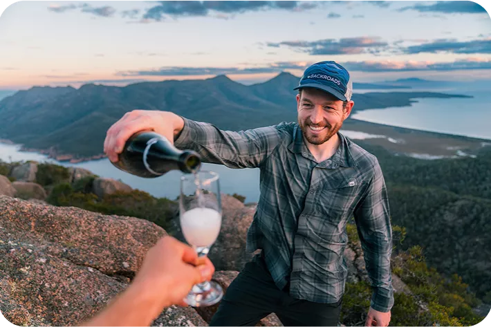 Man pouring wine into a glass