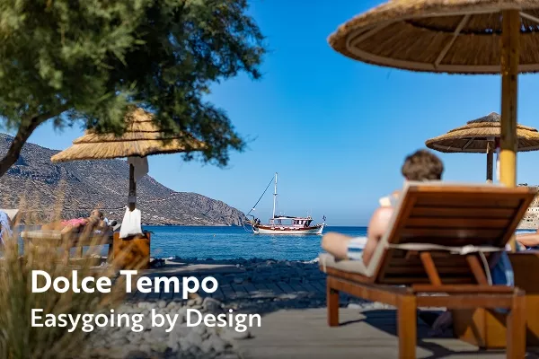 Backroads guests lounging on a chair at the beach