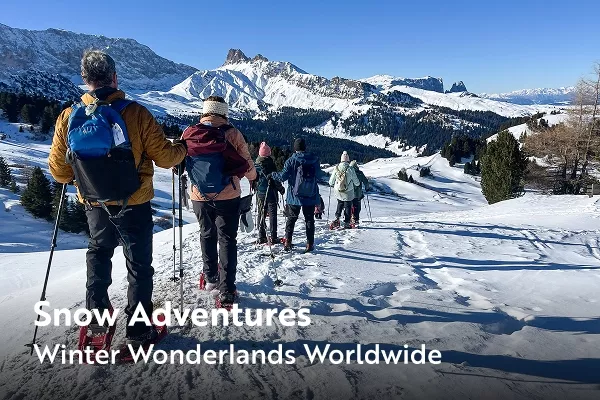 Backroads guests snowshoeing through snow