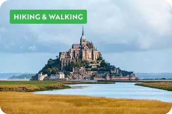 Island with a tall church in the center surrounded by water
