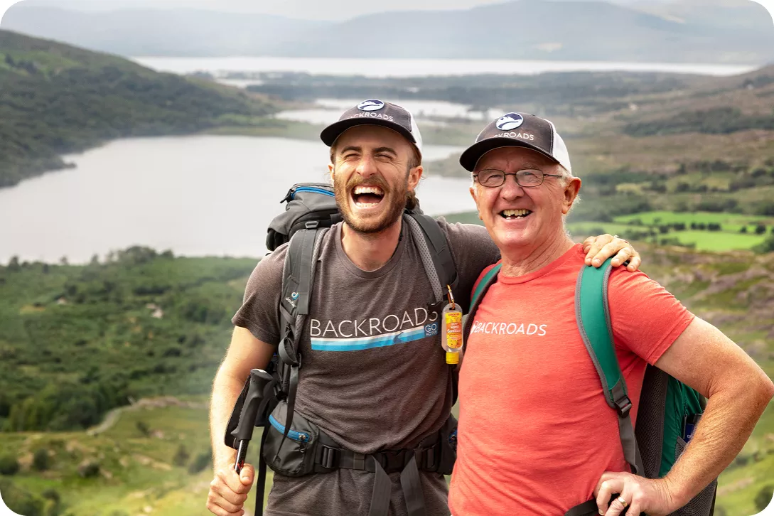 Two backroads guests pose on a hike
