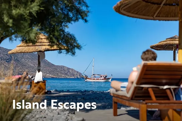 Backroads guest relaxing on a beach with text overlay "island escapes"