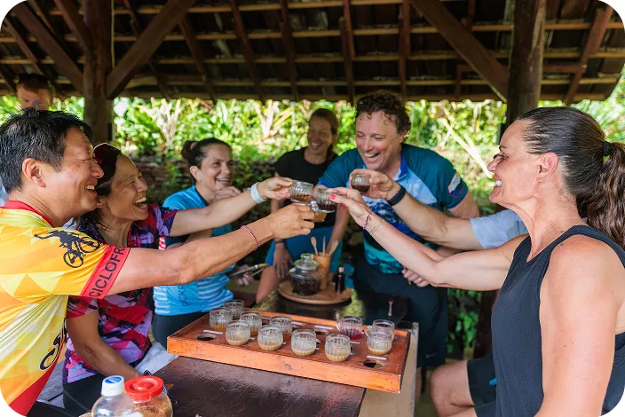 Group of people cheers drinks