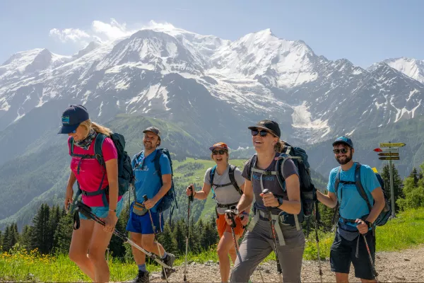 Group of hikers in their 30s & 40s hiking in the Swiss Alps