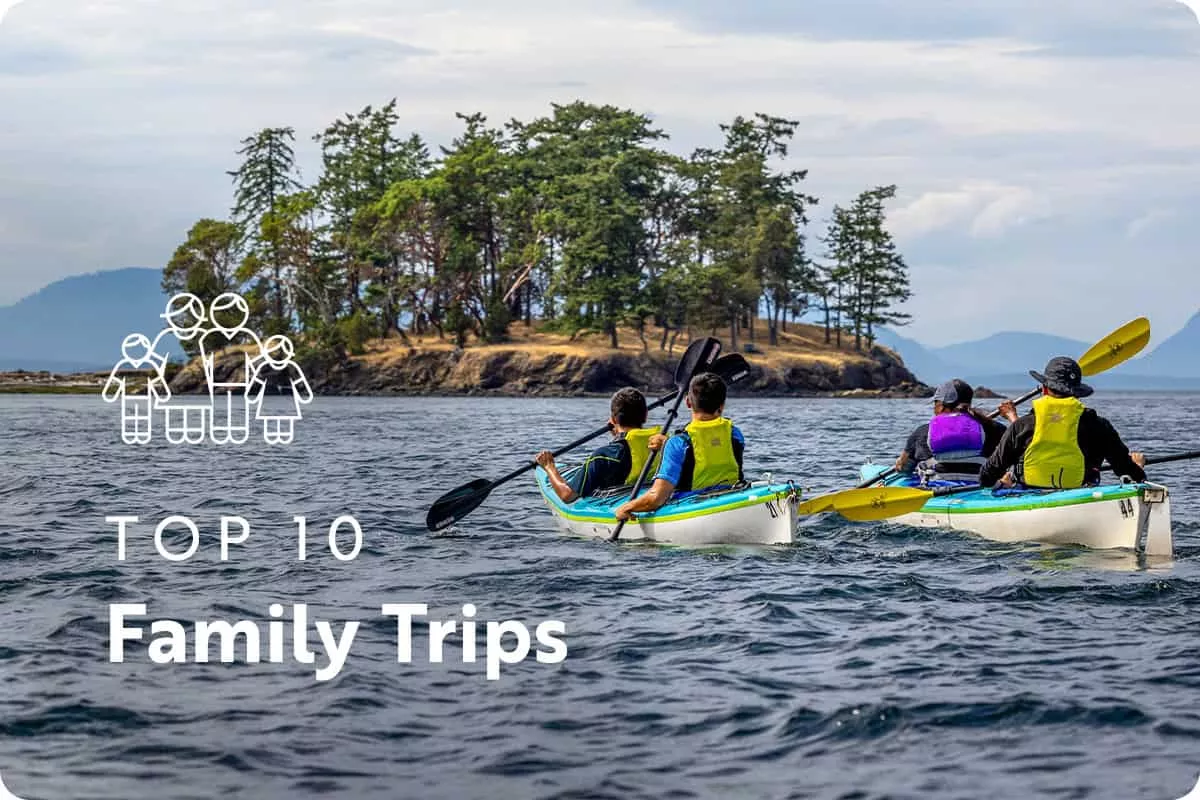 text: top 10 family trips; image: family in a kayak