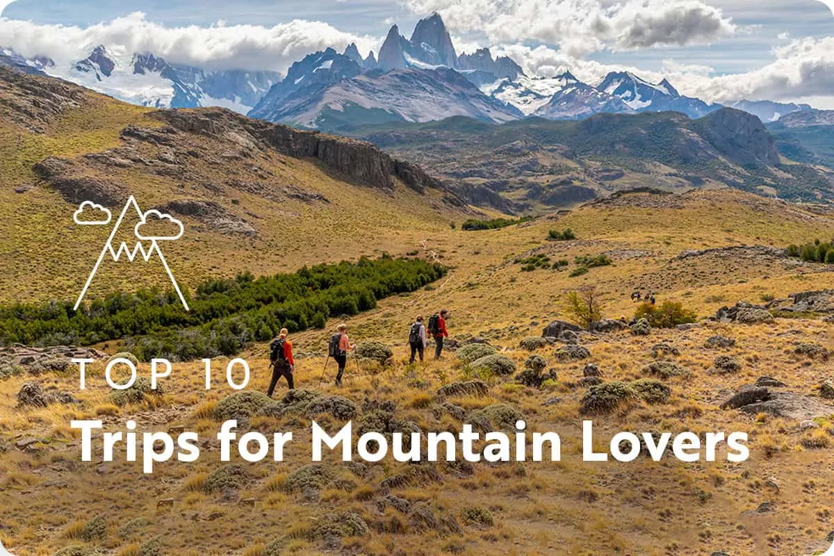 text: top 10 trips for mountain lovers; image: mountain hiking trail