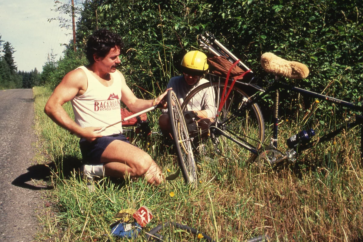 Tom Hale fixes a bike