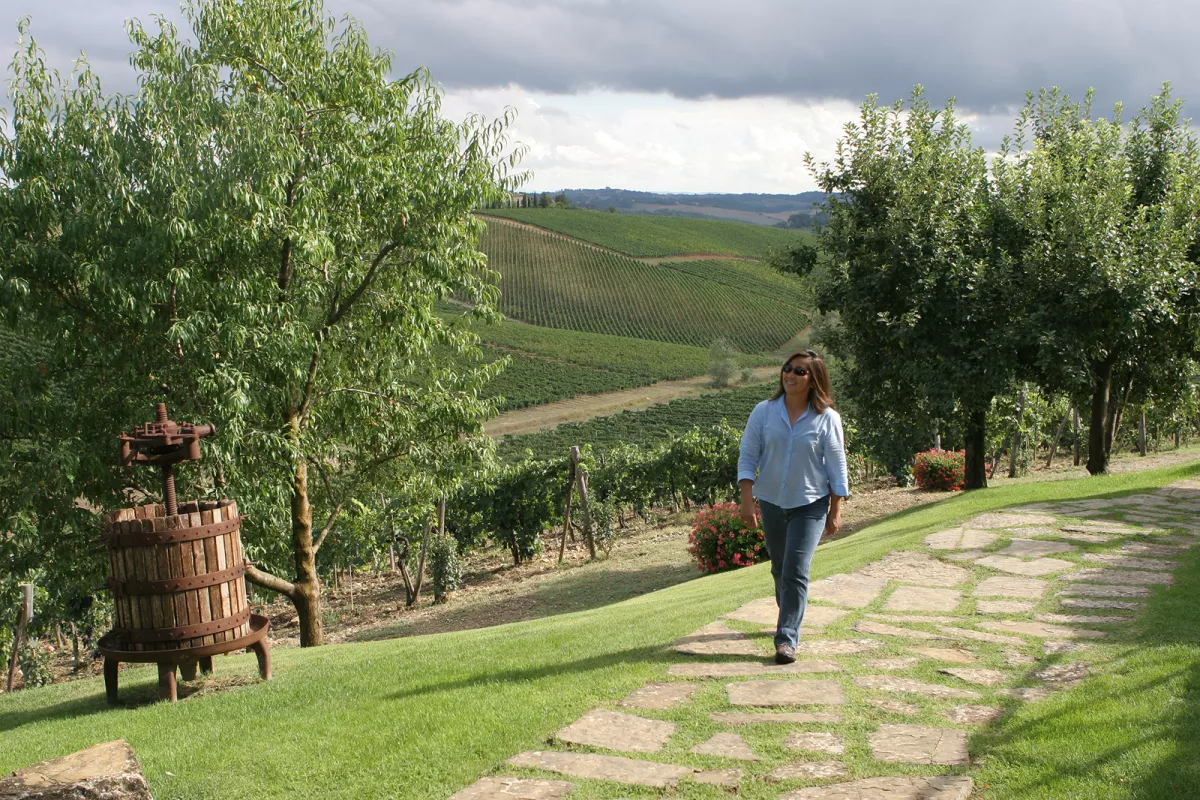 Person walking through green space