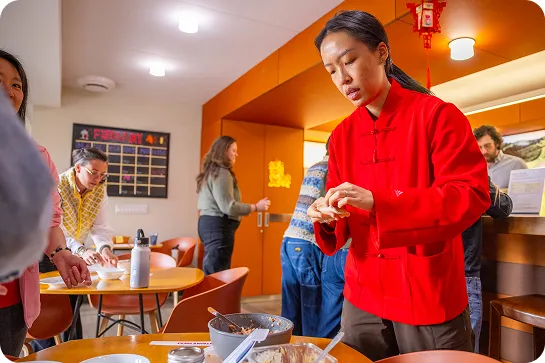 Woman making dumplings by hand