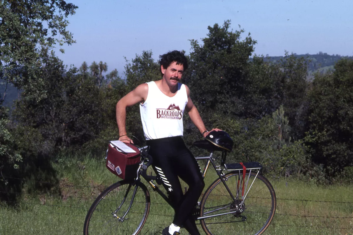 Tom Hale leaning on a bike