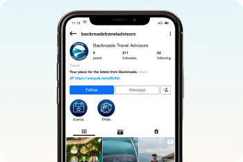 Screenshot of a mobile device with @backroadstraveladvisors displayed on the screen