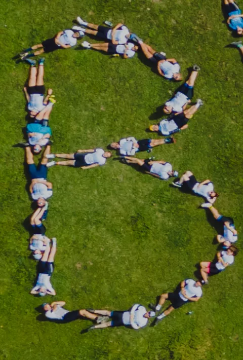 backroads employees spelling a B