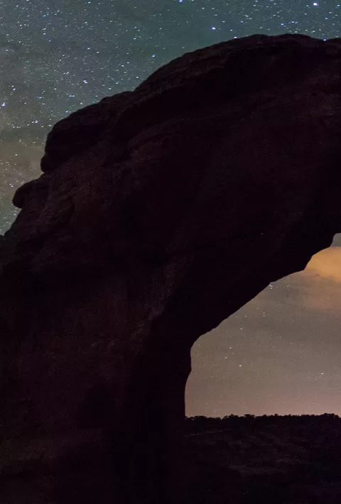 two silhouettes stargazing