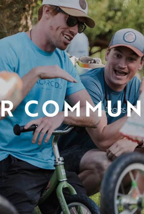 People on bikes, text overlay: our community