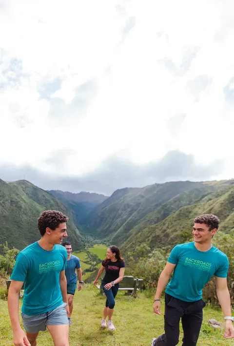 A family hiking in the Andes during a Backroads Galápagos &amp; Andes Family Multi-Adventure Tour.