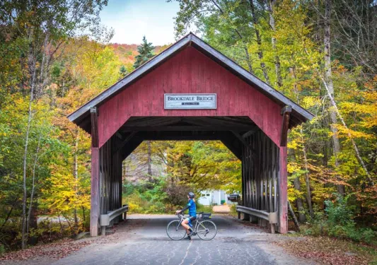 Vermont Bike Tour Covered Bridge with Rider