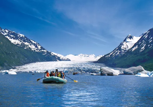 Rafting by a glacier in Alaska