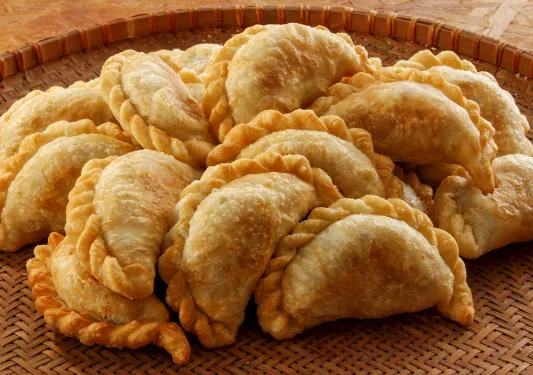 Close-up of platter of empanadas.