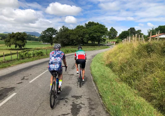 Two Backroads Guests Biking
