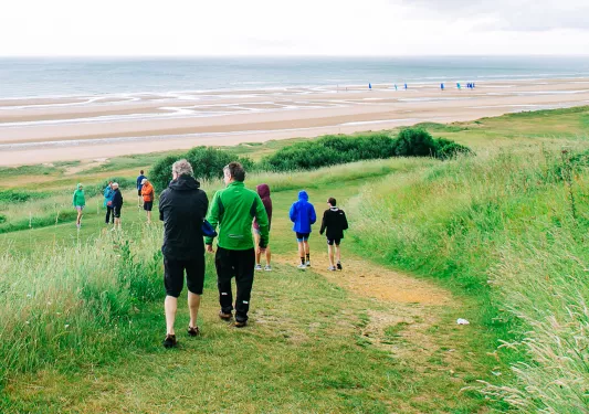Backroads Guests Walking to the Beach in Brittany/Normandy