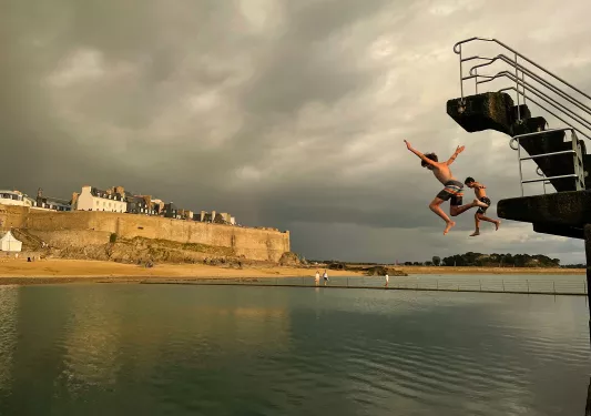 Backroads Guests Jumping Into Water