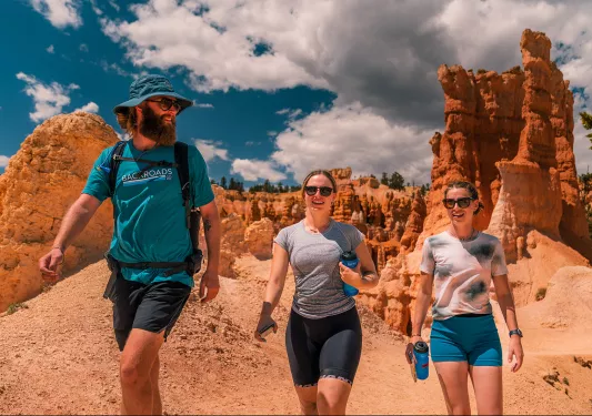 three hikers in canyon - up-close shot