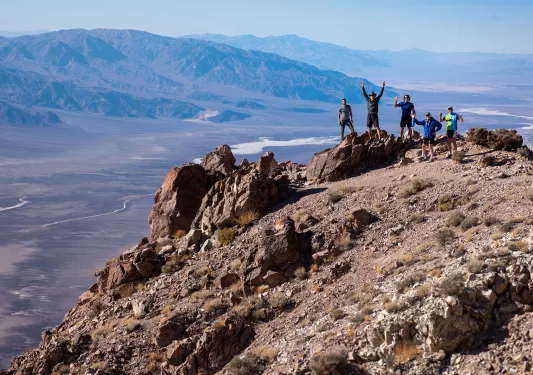 Guests on a desert mountaintop. 