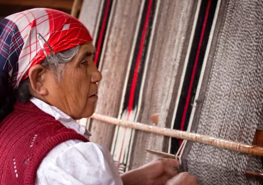 Local woman working with textiles.