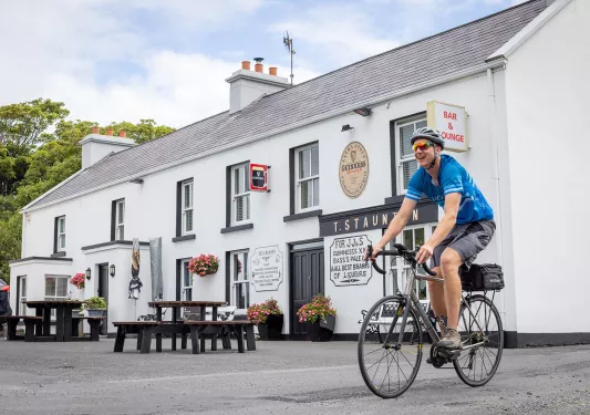 Cyclist in Front of Bar Ireland