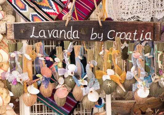 Close-up of Croatian storefront, "Lavanda". Hanging seashells.