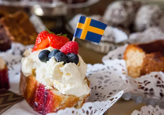 Cake, Blueberries, Strawberries Cream Swedish Flag on Top