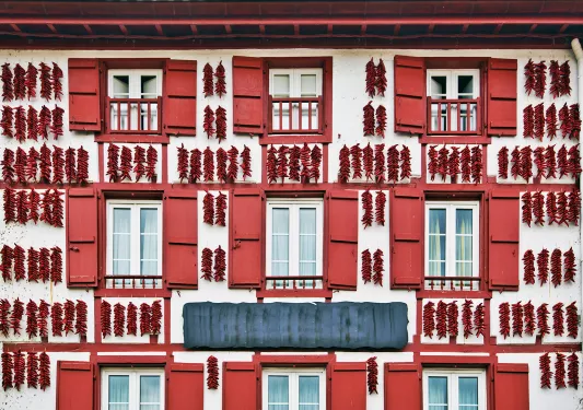 Red Espelette Peppers Drying in the Wall of a Traditional Basque House in Espelette Village, Basque Province of Labourd, France
